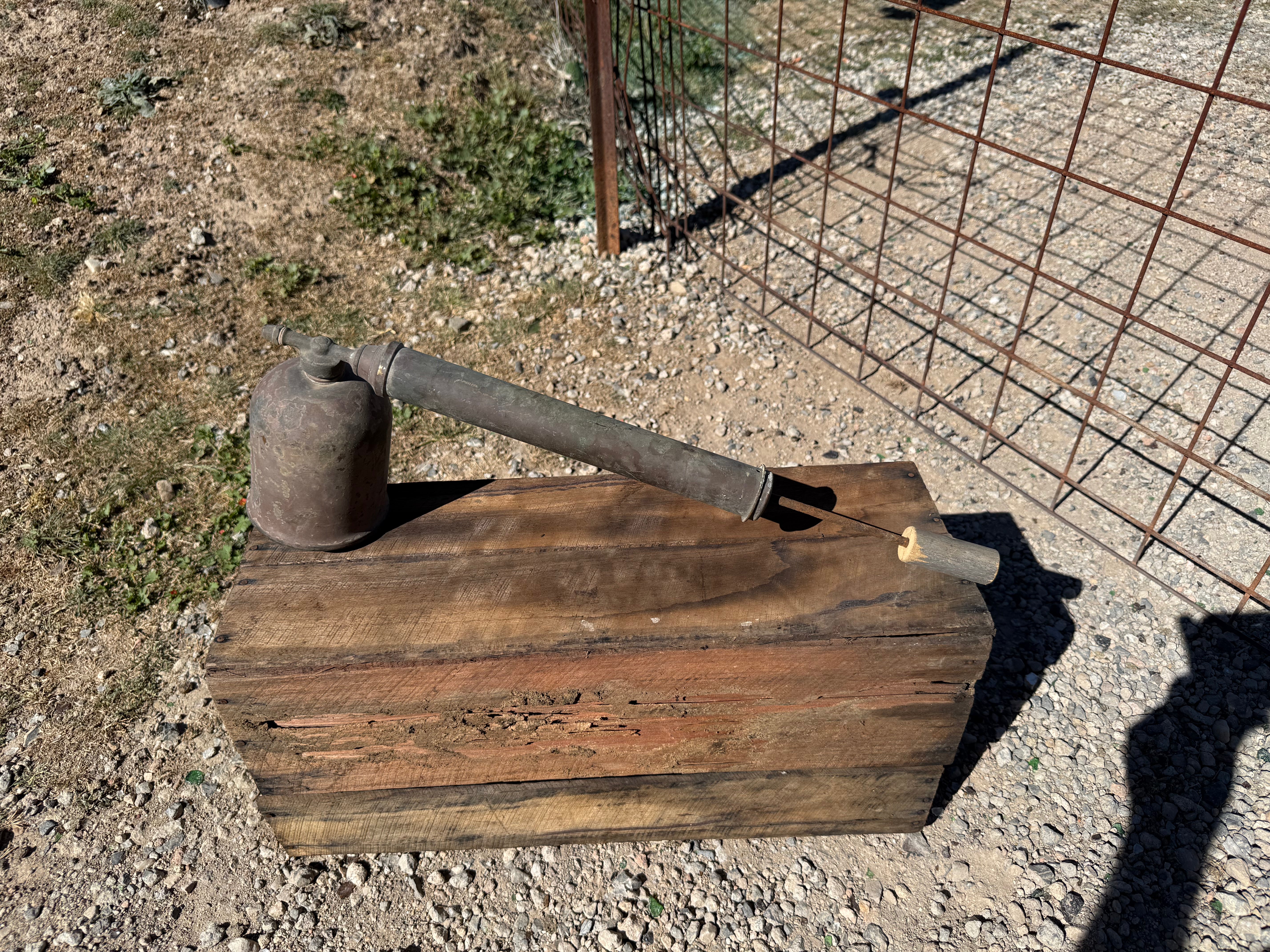 vintage hand-pump insect or pest sprayer,